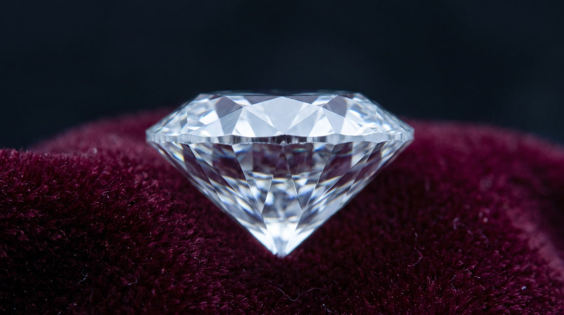 Round brilliant lab-grown diamond in profile showing the table, crown, girdle and pavilion